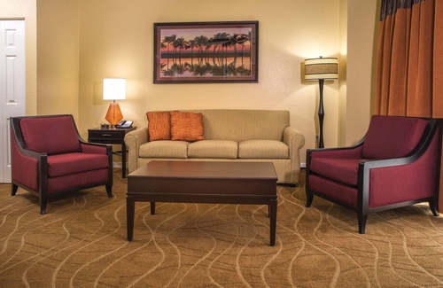 Survey Creek Resort | Relax at our Palm Tree secluded Resort with a poolside bar and waterslide