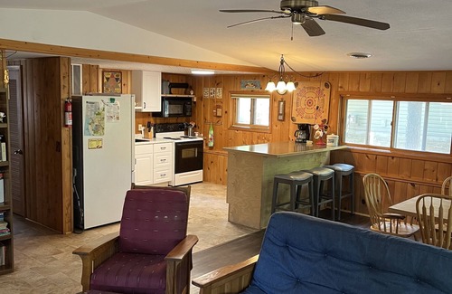 Silver Lake Cottage | RELAX here, deck, AC, assoc. pool & playground, walk to town, on channel, pet OK