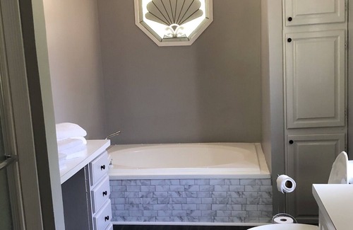 Maryville House | Relax while listening to a Natural Waterfall from your Private Park!
