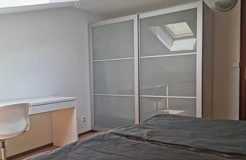 Unterdobling Condo | Relaxation in the attic with pool & gym