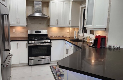 Mississauga House | Renovated 4-Bed Home with Party Basement in Heart of Mississauga & GTA