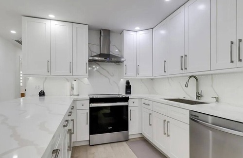 Lochmoor Waterway Estates House | Renovated Modern Home with Big Pool & Ocean Access
