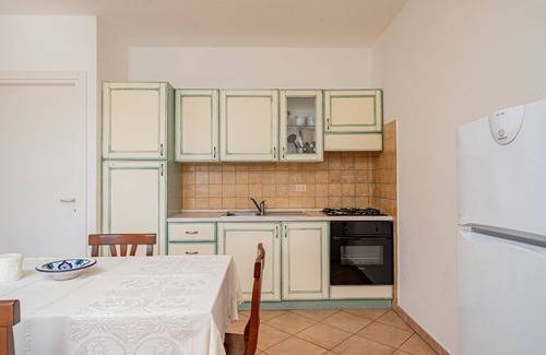 Monte Petrosu Apartment | Residence with pool in Cala Girgolu