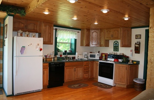 White Cottage Cabin | Rest & relax in a fully furnished cabin on a working orchard and vineyard.