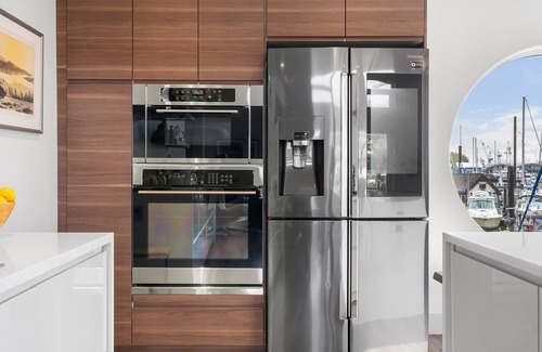 Lower Lonsdale Boat Rental | Retreat to "The Sea Haven" for comfort & style! Stay in an elegant floating home