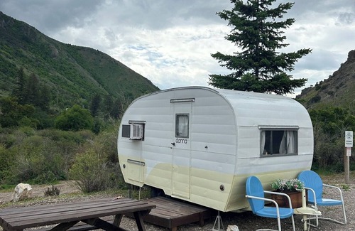 Lava Hot Springs House | Retro Camper king size bed