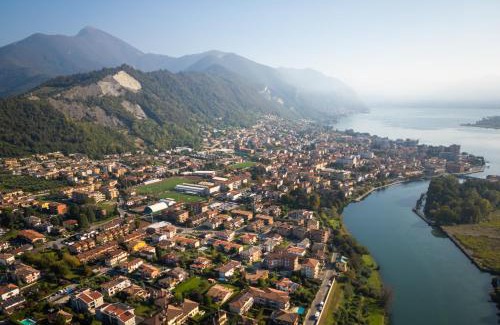 Sarnico Apartment | Rifugio Elegante a due passi dal Lago - Free Wifi Giardino e AC