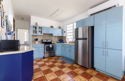Rincon House | Rincon's 5 star Luxury Adult Only Villa Steps from beach, shops and dinning.