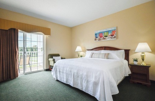 Pembine Hotel | Riverfront Escape! 2 Relaxing Units Near Trails! Pool, Gym & Free Parking!