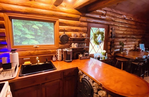 Wentworth Cabin | Riverfront Log Cabin with Mountain Views - Hot Tub & Wood Burning Fireplace