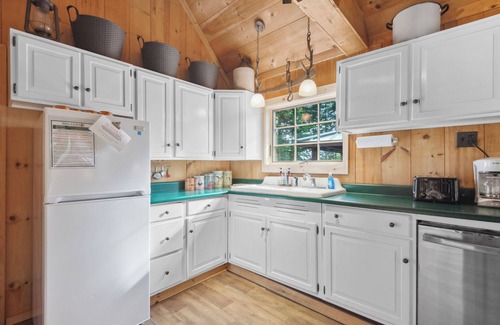 Rangeley House | Rock Ledge - Relax & Renew in turn-of-century log cabin with side cabin