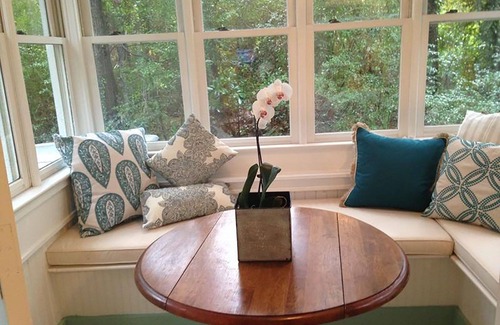 Folly Beach Cottage | Romantic, cozy cottage nestled amongst live oaks & palms, a block from beach.