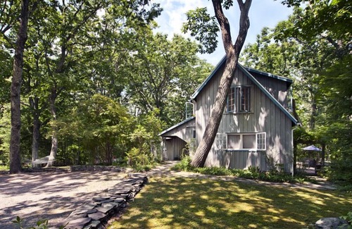 Woodstock Cottage | Romantic + historic artist cottage with storybook charm in private woods!