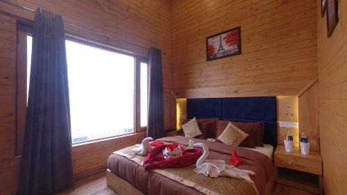 Naina Range Hotel | Rooftop Cottages & Restaurant, Pangot