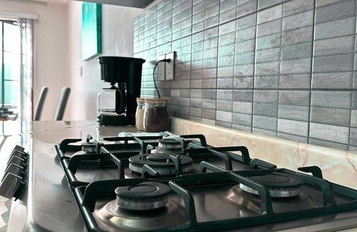 San Agustin de las Juntas House | Rooftop w/mountain view & Waterfall pool. 7min to airport -15min to downtown