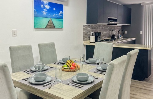 San Agustin de las Juntas House | Rooftop w/mountain view & Waterfall pool. 7min to airport -15min to downtown