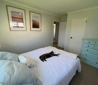 Papamoa Beach House | Room by the beach