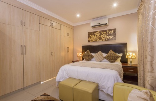 Ballito House | Room in Guest Room - Ezulwini Guest House - Queen Room With Balcony, Pool View & Jacuzzi in Balito