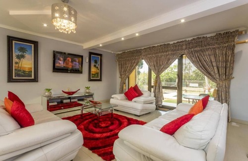 Ballito House | Room in Guest Room - Ezulwini Guest House - Queen Room With Balcony, Pool View & Jacuzzi in Balito