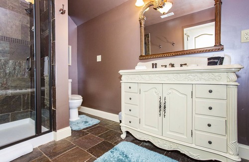 La Grange Bed & Breakfast | Room with a View King Luxury Suite with extra-large large soaking tub and a chaise lounge with a view of the pond.
