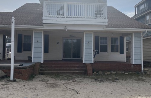 Cottage Line Apartment | Roomy Beachfront Apartment, Deck, Game Room! by RedAwning