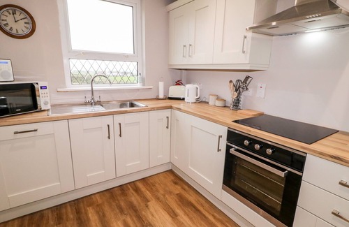 Omagh Cottage | ROSE COTTAGE, pet friendly, with a garden in Omagh