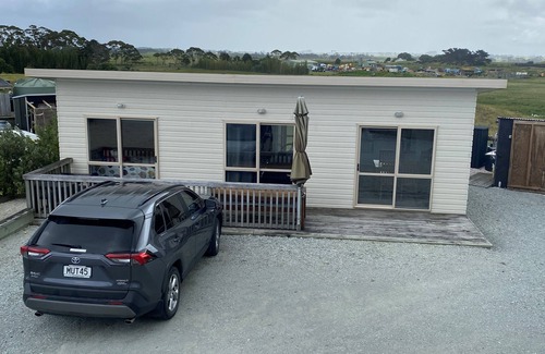 Karkari Peninsula House | Rowlys Resort Back Bach suitable for family of 4 or 2 couples