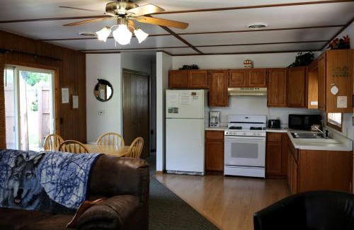 Tomah House | Rustic Family Cabin Rental with a Fire Pit near Wisconsin Dells