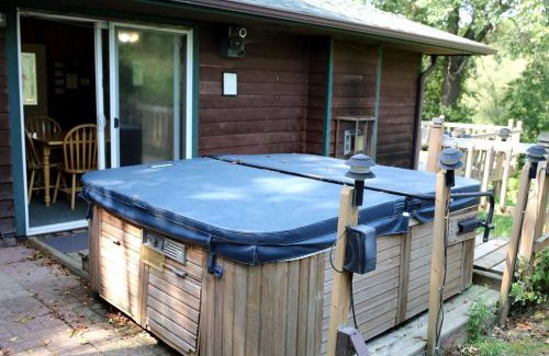Tomah House | Rustic Family Cabin Rental with a Fire Pit near Wisconsin Dells