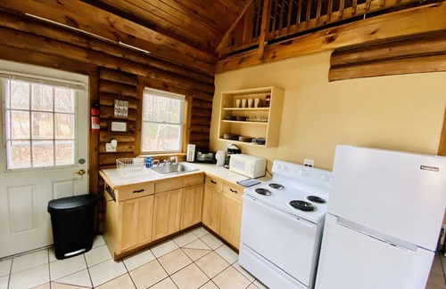 Twin Mountain Cabin | Rustic riverfront cabin- 15 minutes from the Cog Railway and Crawford Notch.