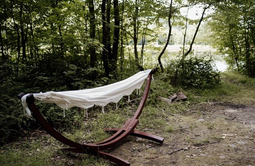 North Woodstock RV Rental | Safari Tent Site 9 | 1 Queen Bed & 1 Bunk Bed | Pond View