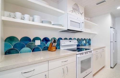 Whitney Beach Cottage | Sailfish Gulf Suites #3, Modern Amenities, Steps to the Beach