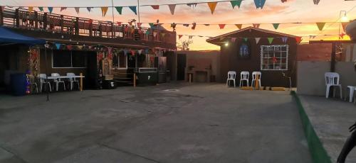 Rosarito House | Salón y habitaciones 783