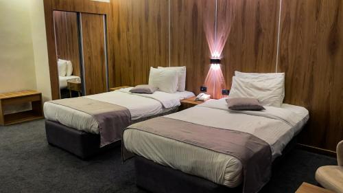 Jabal Al-Hussein Hotel | Sandy Palace Hotel Amman