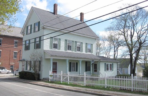 Wiscasset House | Sea breeze and summer flowers out on the deck