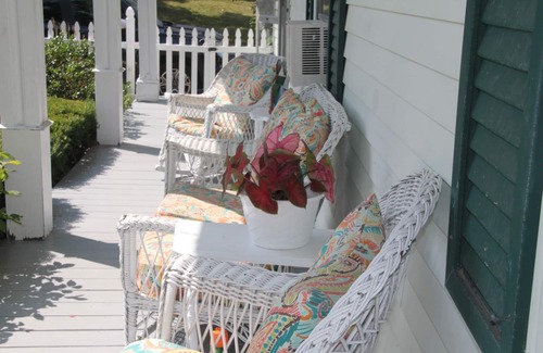 Wiscasset House | Sea breeze and summer flowers out on the deck