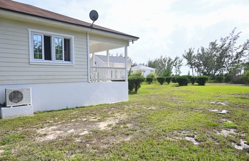 Tarpum Bay Cottage | Seabreeze Cottage - Steps to own private beach.