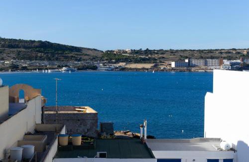 Għadira Apartment | Seaside Serenity 6 - few mins walk to the beach by QuickTrips