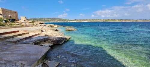 Għadira Apartment | Seaside Serenity 6 - few mins walk to the beach by QuickTrips