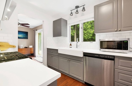 Warkworth House | Secluded modern house, 5 forested acres, running stream, hot tub, game room