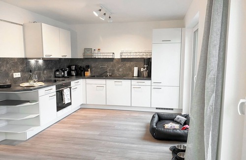 Tossens Apartment | SeeZeit - Holiday apartment at the Pütten. Sauna. Terrace. Dog friendly.