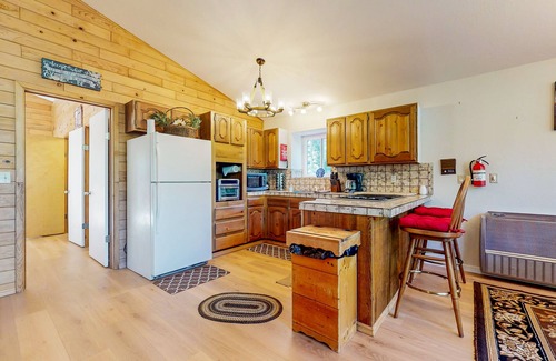 Shingletown House | Serene retreat w/2 kitchens, 2 living rooms, huge deck+ hot tub-creekfront view