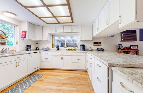 Shingletown House | Serene retreat w/2 kitchens, 2 living rooms, huge deck+ hot tub-creekfront view