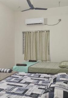 Gokarna House | Shri Virajita - Budget AC twin bed- room