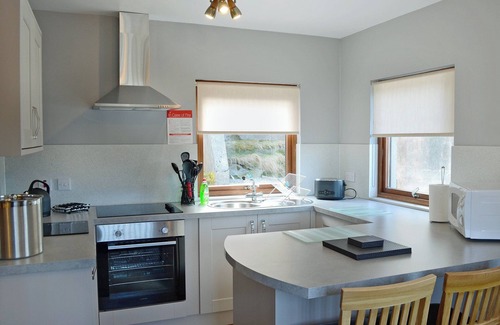 Gairloch Cottage | Single storey detached cottage for couples overlooking Gairloch Bay in Wester Ross .