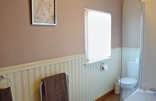 Gairloch Cottage | Single storey detached cottage for couples overlooking Gairloch Bay in Wester Ross .