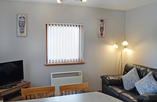 Gairloch Cottage | Single storey detached cottage for couples overlooking Gairloch Bay in Wester Ross .