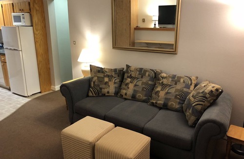 Carrabassett Valley Apartment | Ski In/Out at SugarloafnShort Walk or Shuttle to Bars and Base AreanSleeps 4n