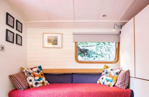Angel Boat Rental | Slash Arts houseboat on secluded mooring in central London