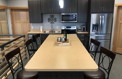 Newport Condo | Sleek, modern one bedroom apartment in the heart of Newport.